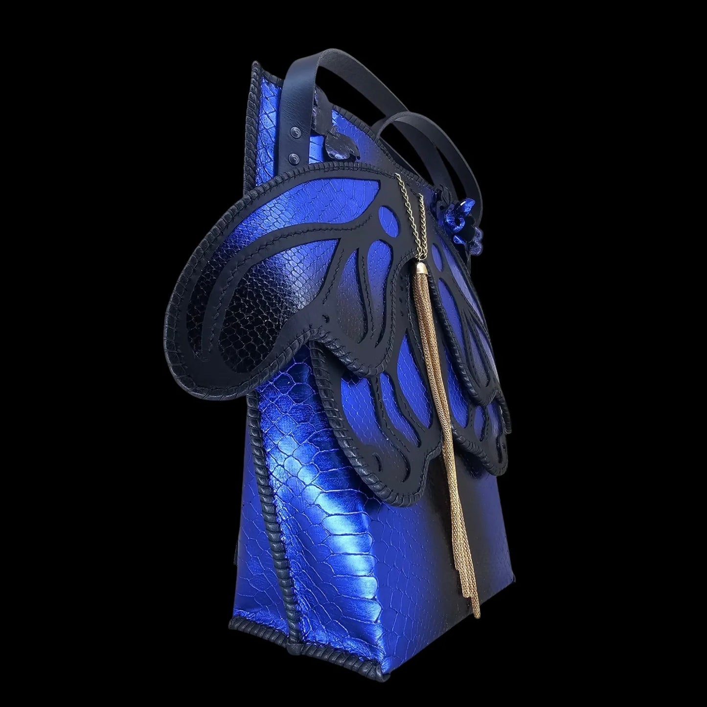 Handmade blue leather handbag with hand-cut stylized wings over cobalt-blue reptile-textured leather - AG Design, Arad, Romania