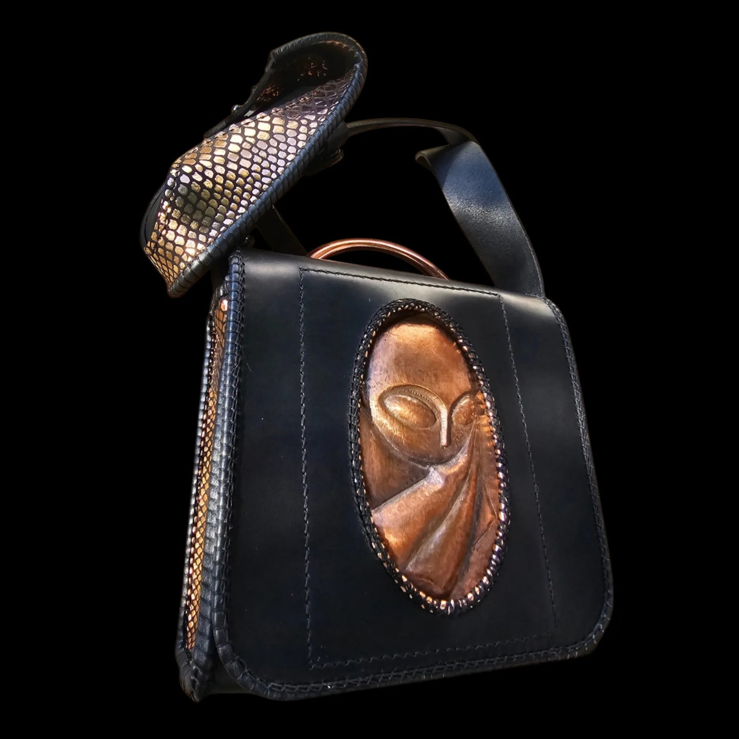 Handmade dark leather bag with a carved wooden sculptural element - AG Design, Arad, Romania