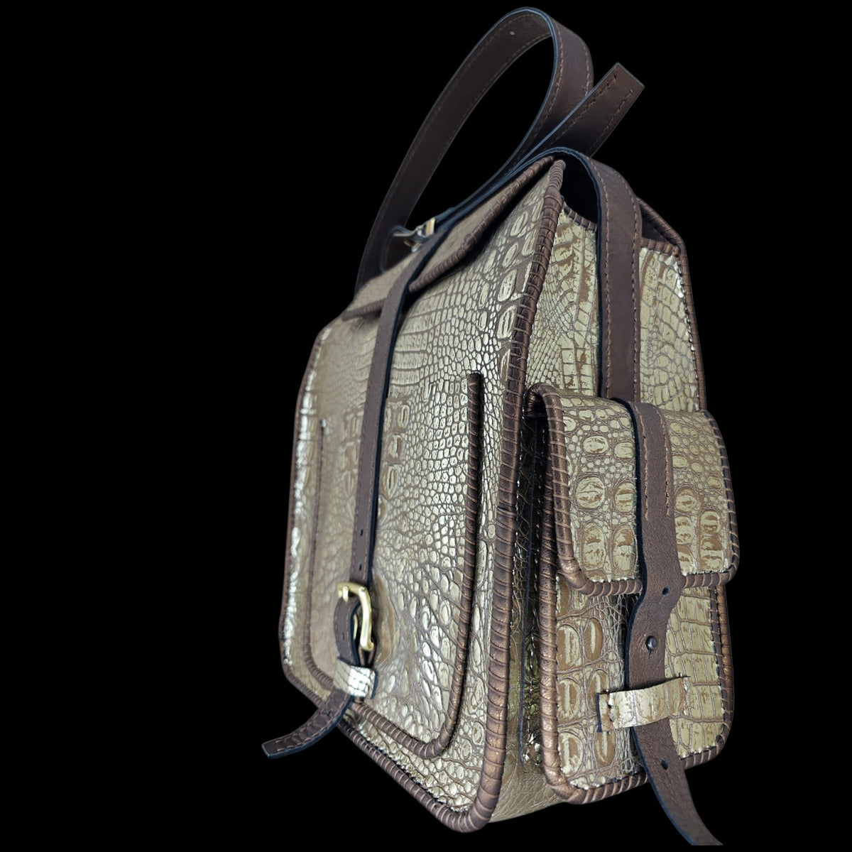 Side view of a handmade crocodile-embossed leather crossbody bag showing front pocket and buckle detail - AG Design, Arad, Romania