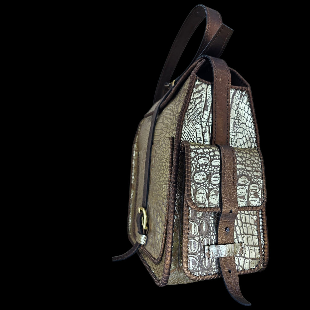 Wide angle side view of a handmade crocodile-embossed leather crossbody bag showing overall structure and front buckle strap - AG Design, Arad, Romania