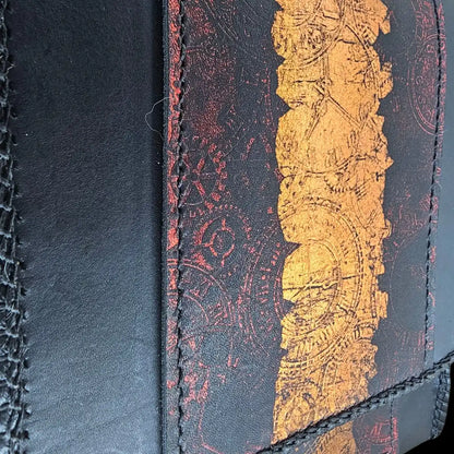 Handmade black leather shoulder bag with a red and gold clock mechanism embossed by heat and pressure - AG Design, Arad, Romania