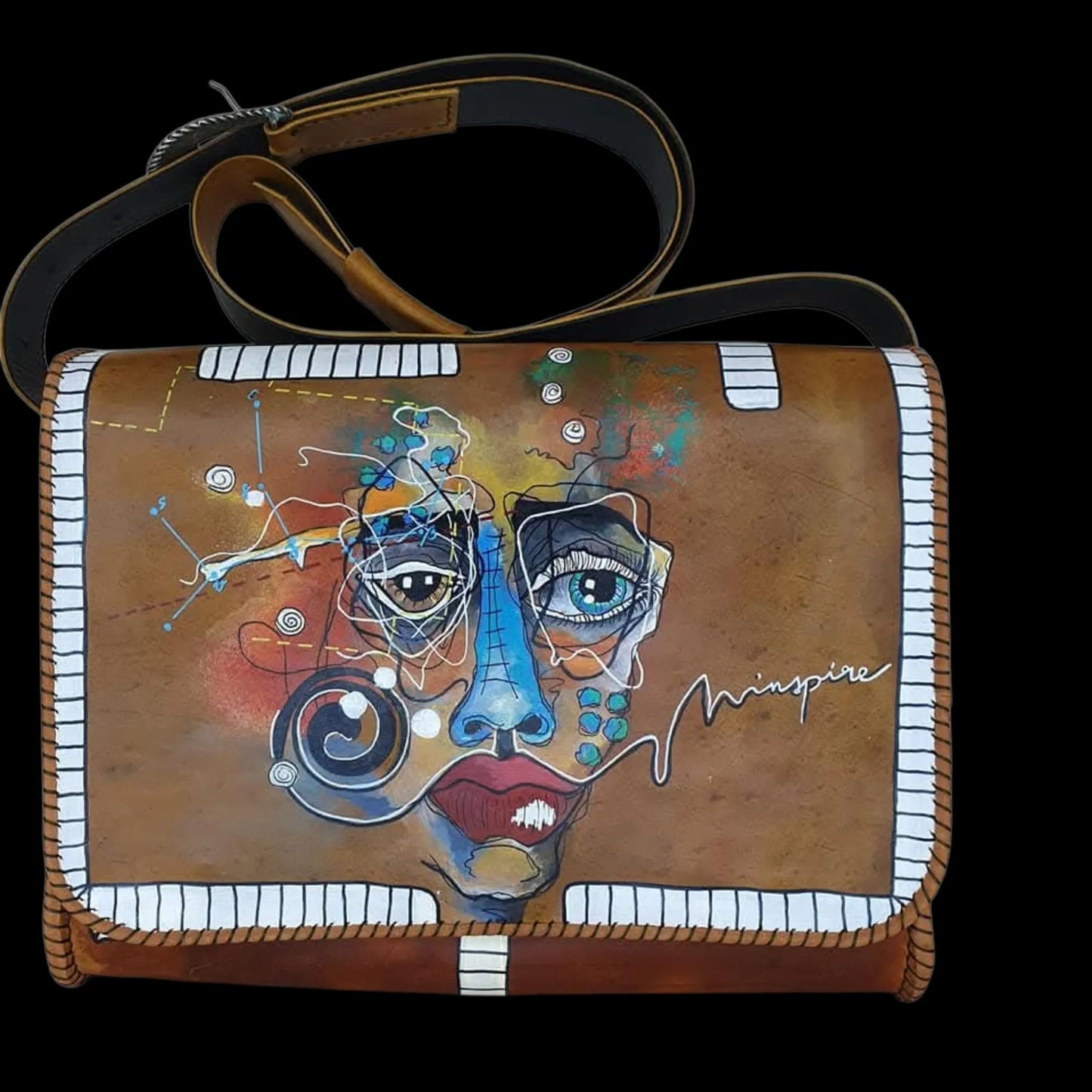 Handmade brown leather messenger bag with a painted blue face and studs - AG Design, Arad, Romania