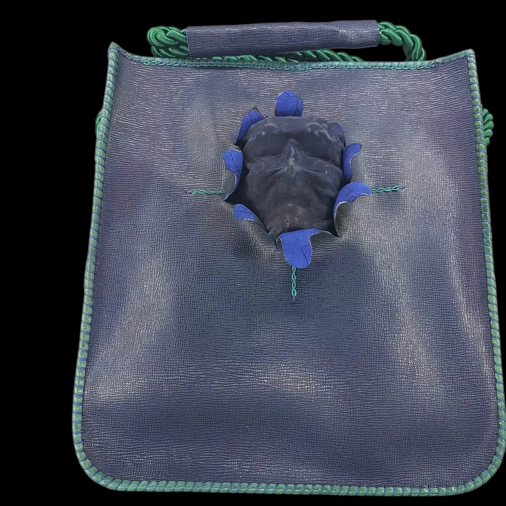 Handmade dark leather bag with a sculpted face - AG Design, Arad, Romania