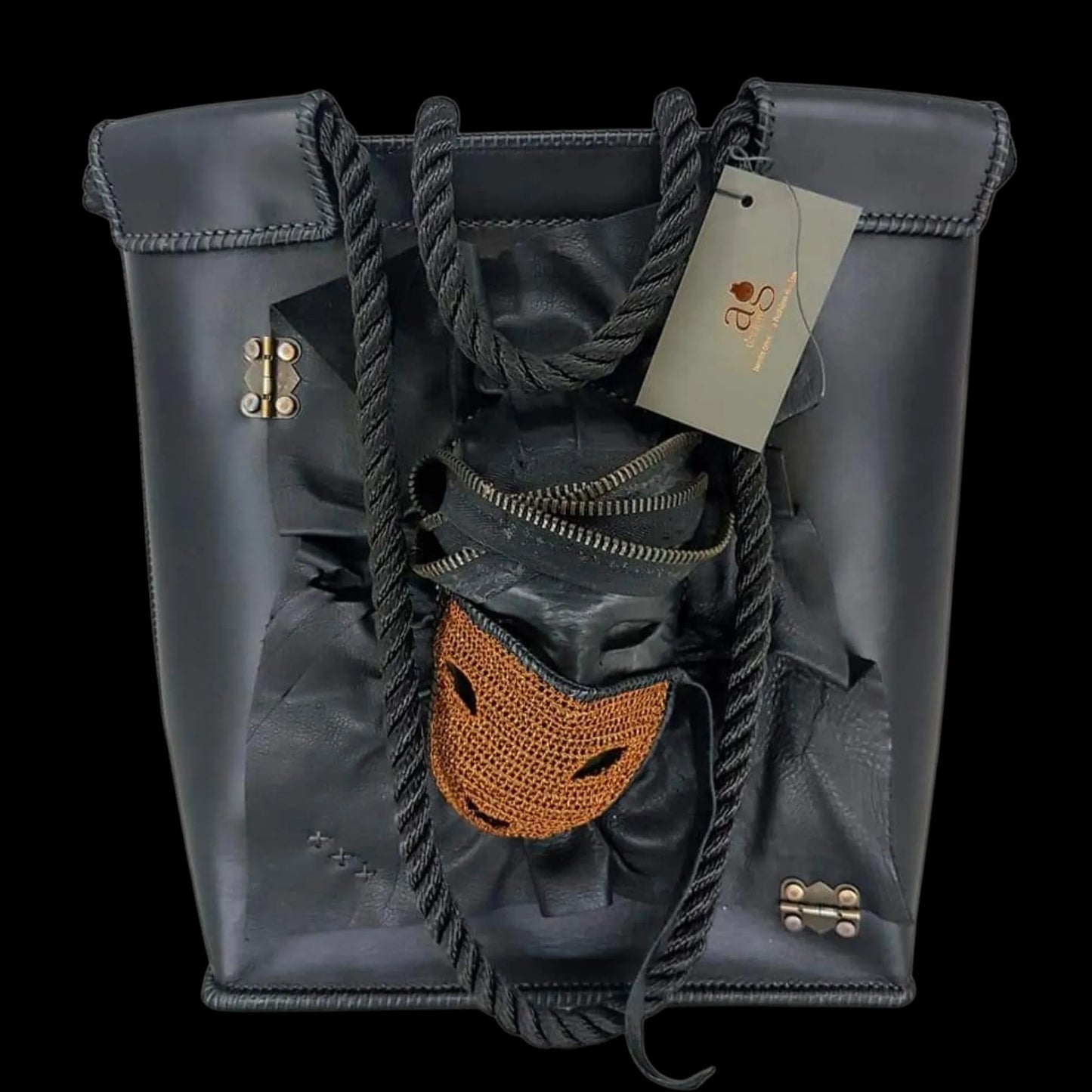 Handmade grey leather bag with a sculpted face - AG Design, Arad, Romania