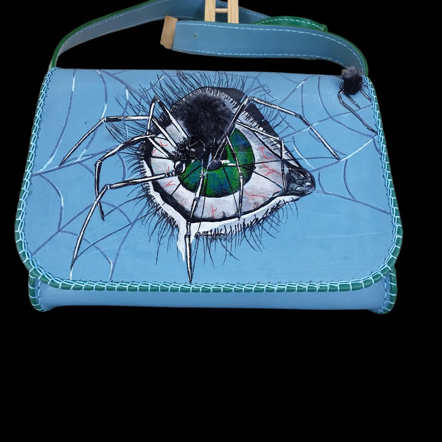 Handmade turquoise leather bag with a sculpted dark flower centre - AG Design, Arad, Romania
