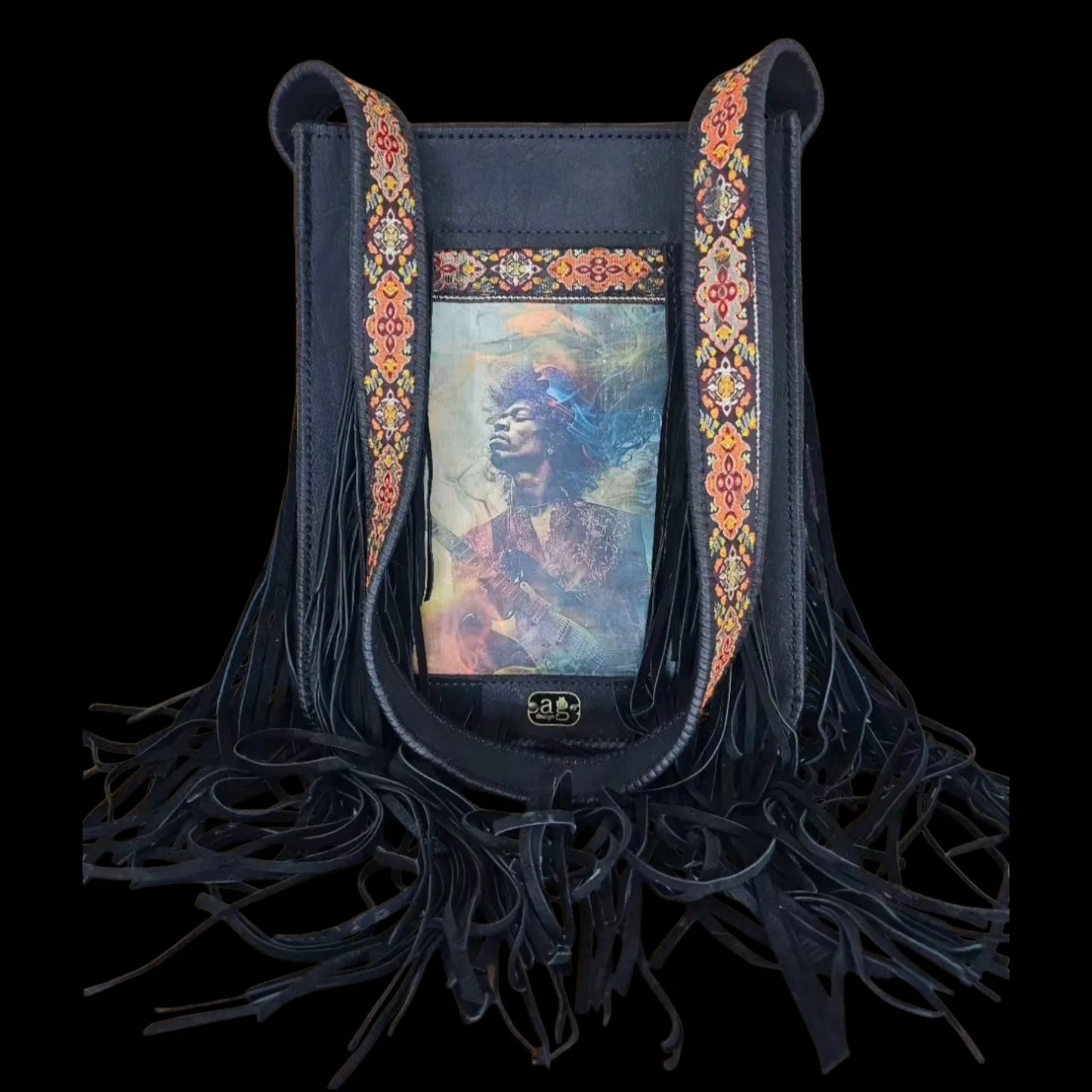 Handmade brown leather crossbody bag with a hypnotic photo transfer framed by long bohemian fringe and an embroidered strap - AG Design, Arad, Romania