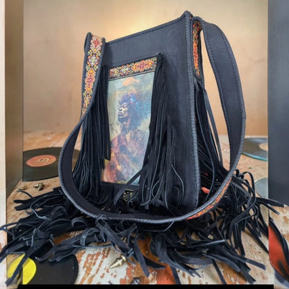 Handmade brown leather crossbody bag with a hypnotic photo transfer framed by long bohemian fringe and an embroidered strap - AG Design, Arad, Romania