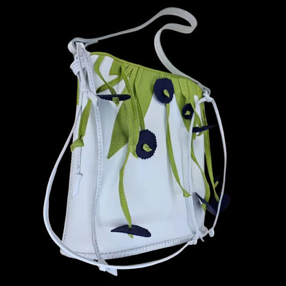 Handmade white leather backpack with green leaves and blue flowers left loose and unstitched - AG Design, Arad, Romania