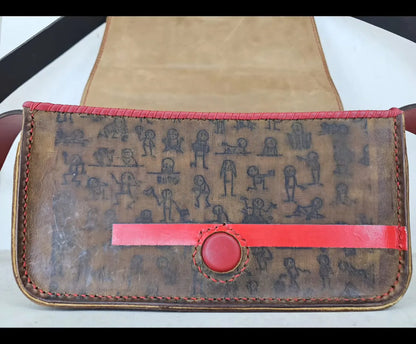Handmade red leather purse with a stitched front message and minimalist silhouettes on raw-textured leather - AG Design, Arad, Romania