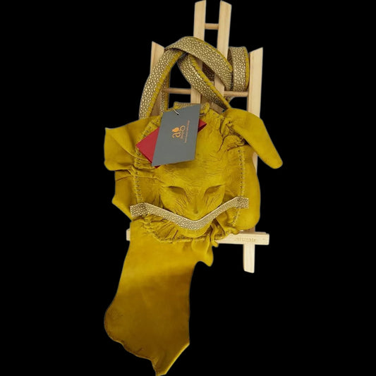 Handmade mustard leather drawstring bag with sculptural folds - AG Design, Arad, Romania