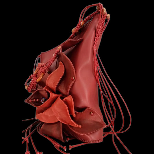 Handmade red leather drawstring bucket bag with sculptural folds - AG Design, Arad, Romania