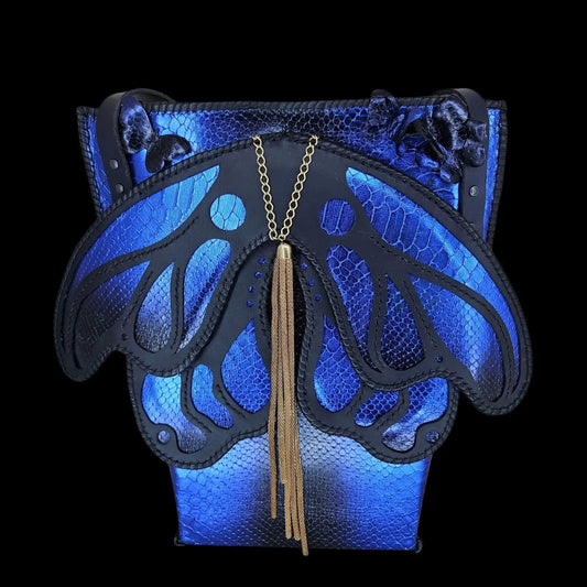 Handmade blue leather handbag with hand-cut stylized wings over cobalt-blue reptile-textured leather - AG Design, Arad, Romania
