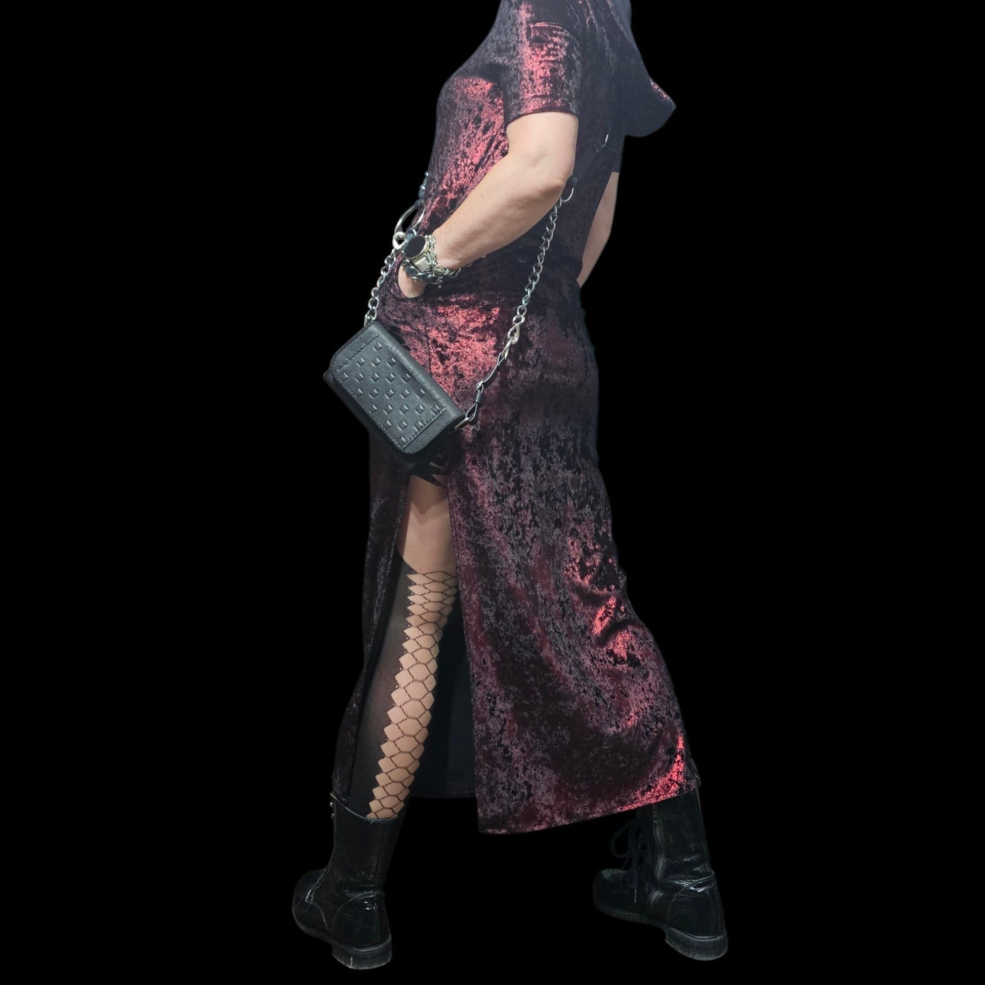 Handmade black leather belt bag worn crossbody, back view with the chain over the shoulder - AG Design, Arad, Romania