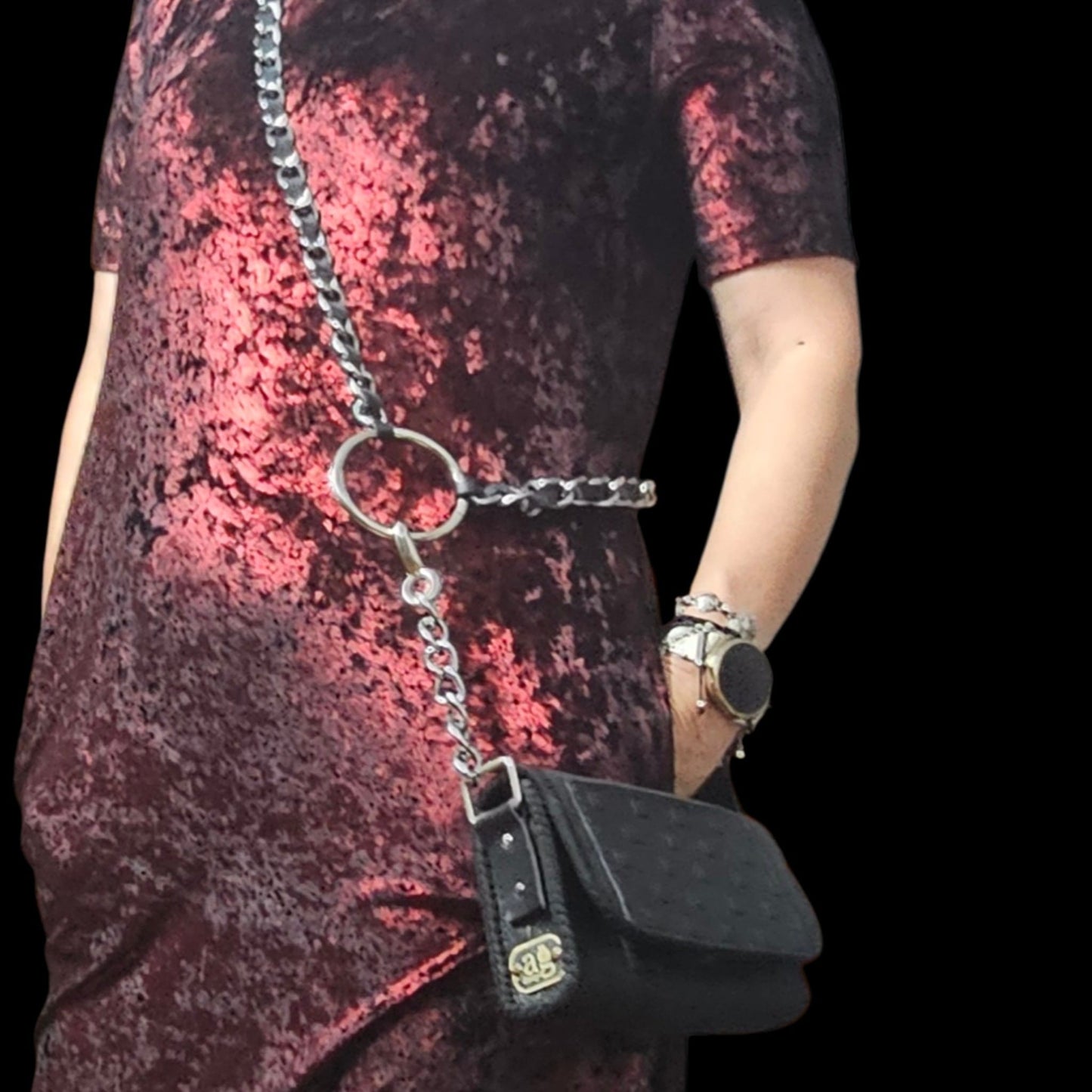 Close-up of the front of a handmade black leather belt bag with a patterned lamb leather flap - AG Design, Arad, Romania