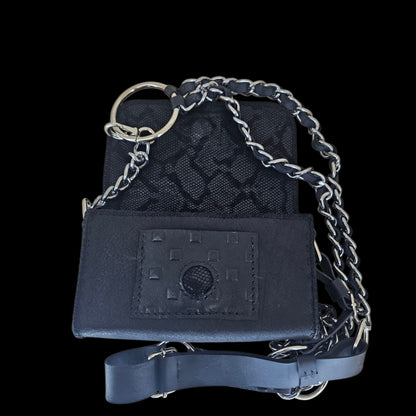 Handmade leather belt bag opened, showing the patterned lamb leather lining and the inner pockets - AG Design, Arad, Romania