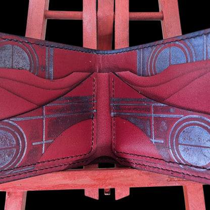 Hand-stitched red leather wallet, Gate of the Kiss (Poarta Sărutului) motif pressed into the hide — AG Design, Arad, Romania