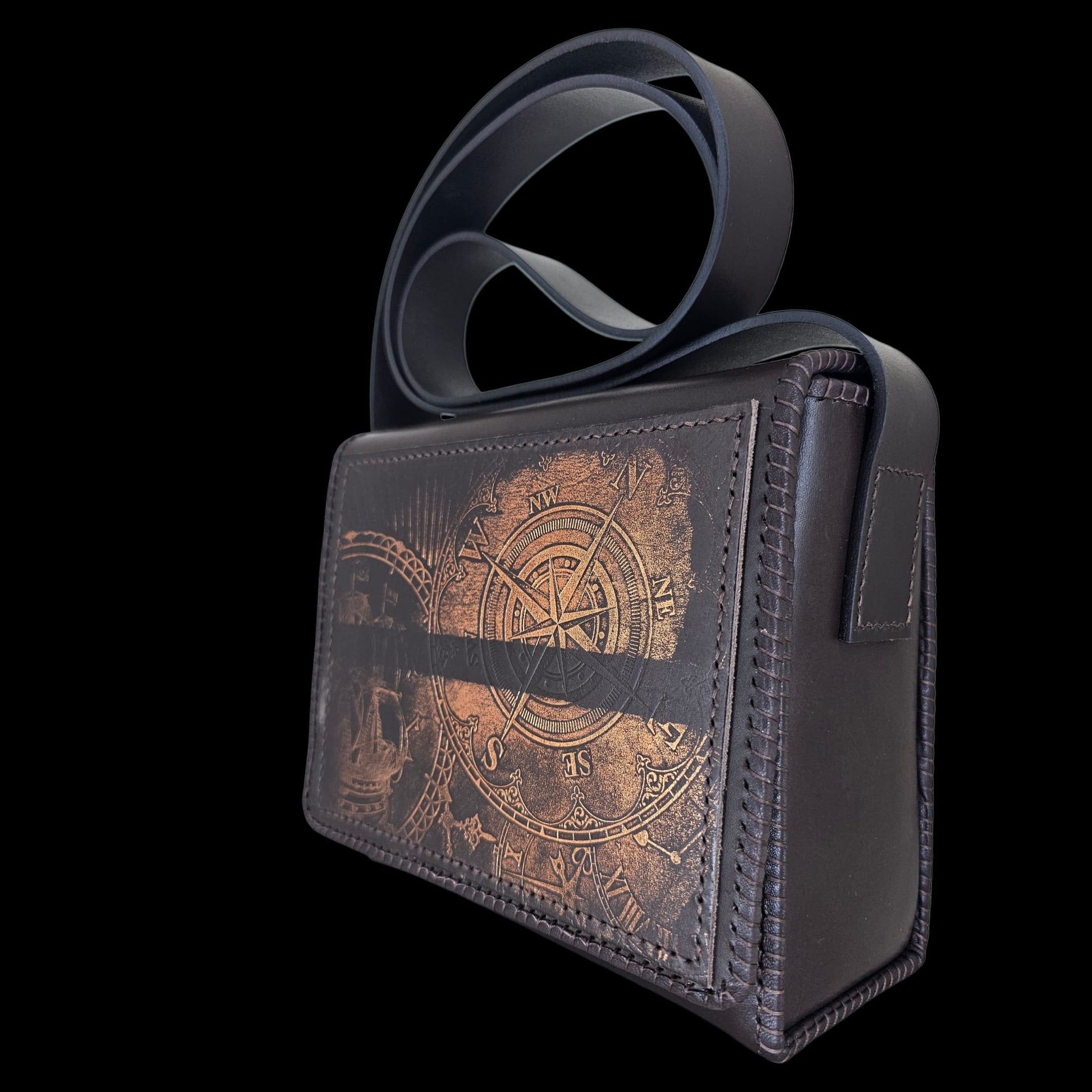 Angled side view of a handmade brown leather shoulder bag showing the flap and shoulder strap - AG Design, Arad, Romania