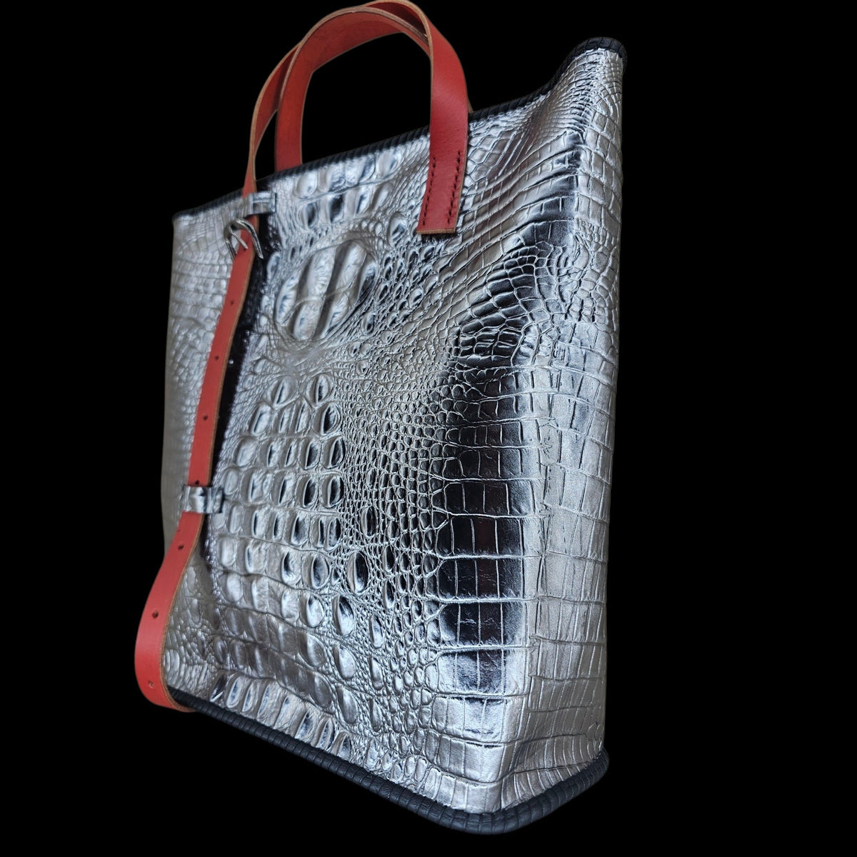 Side view of a handmade silver crocodile-embossed leather shoulder bag - AG Design, Arad, Romania.