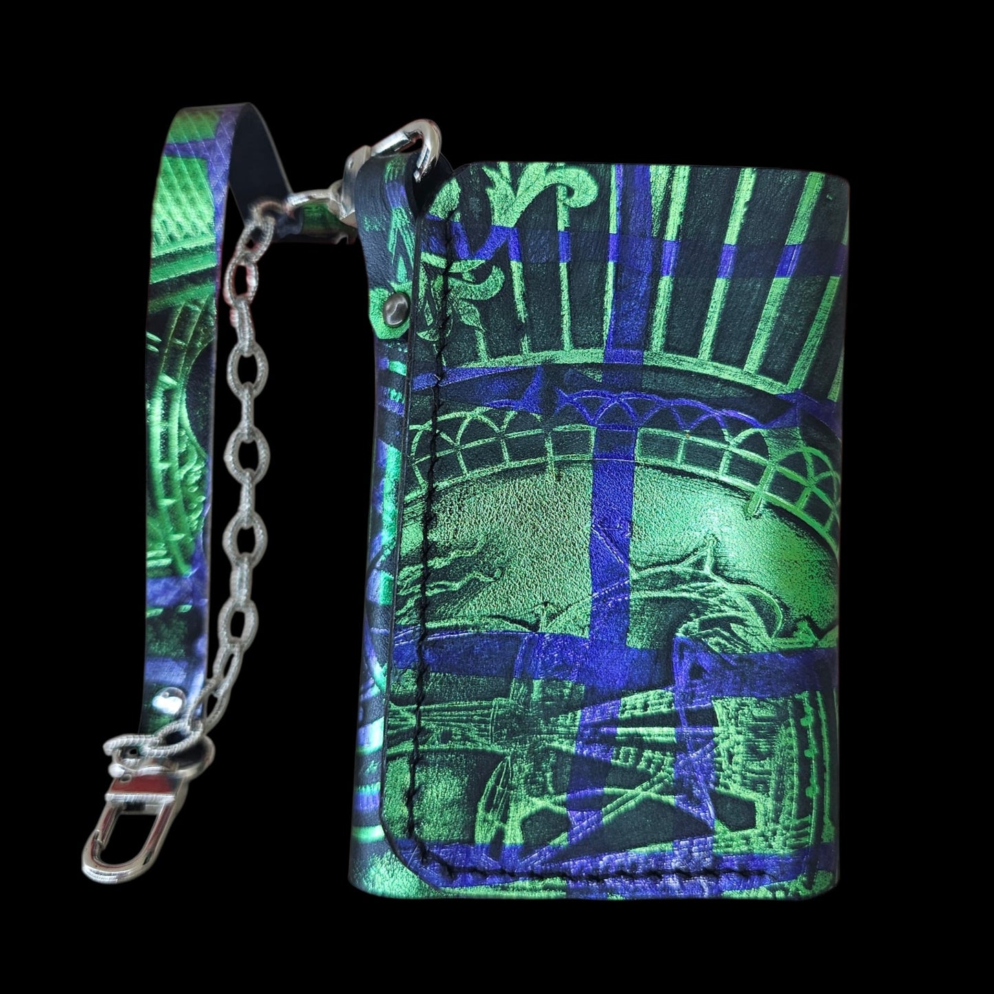 Close-up of the heat-pressed pattern in emerald green and royal blue on a handmade black leather wallet - AG Design, Arad, Romania