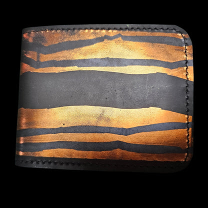 Close-up of copper worked into black leather under heat and pressure - AG Design, Arad, Romania