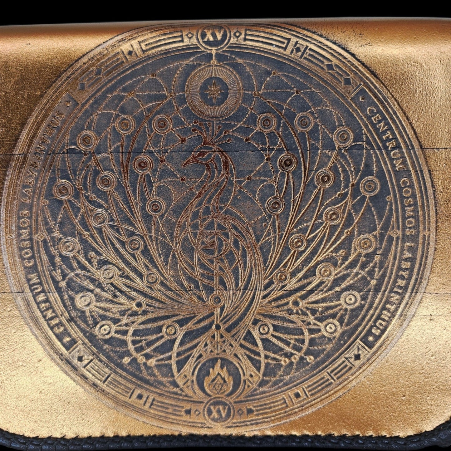 Embossed phoenix medallion on the gold leather flap of a handmade crossbody bag - AG Design, Arad, Romania
