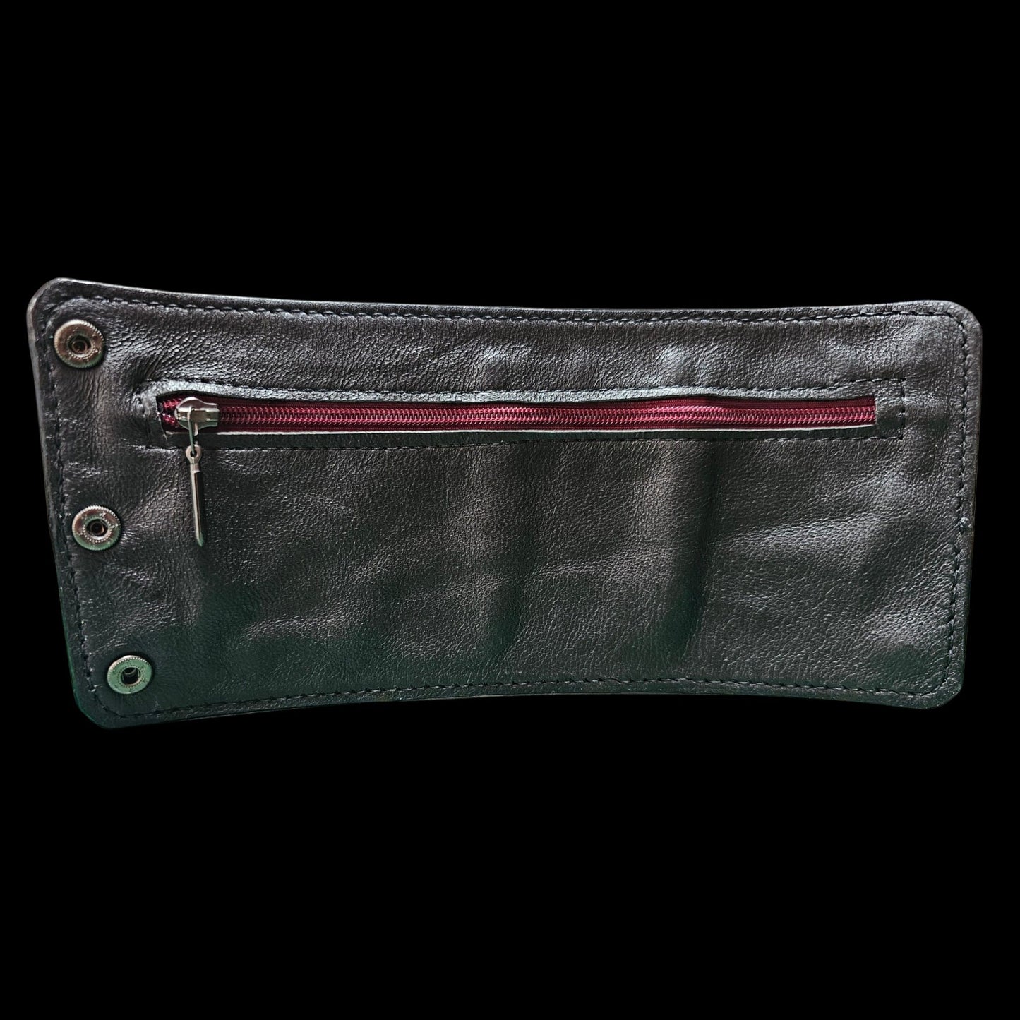 Inside of a handmade leather cuff wallet, showing the soft lining and the burgundy zip pocket for notes - AG Design, Arad, Romania