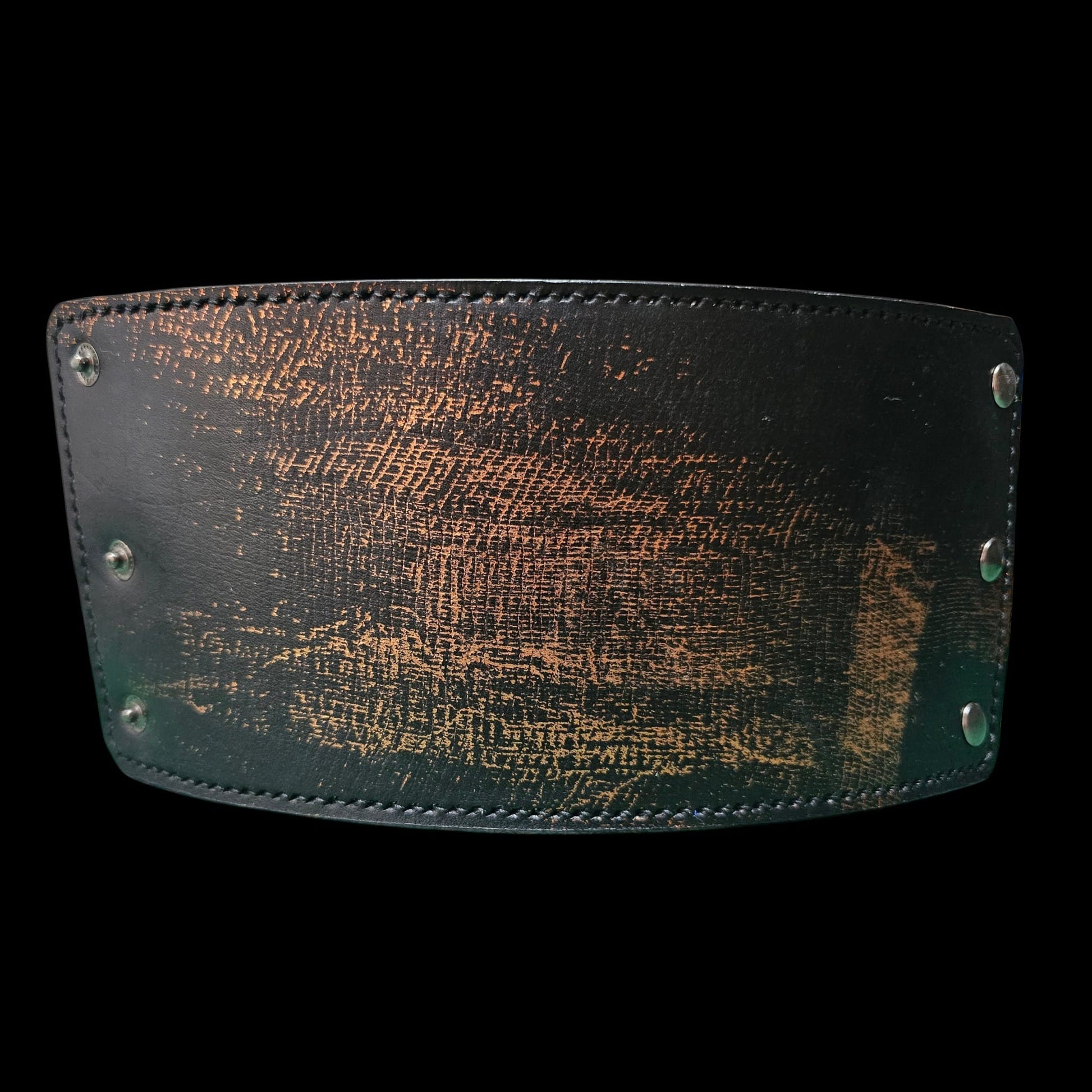 Handmade leather cuff wallet laid flat, showing the hand-worked copper patina and the row of snap fasteners - AG Design, Arad, Romania