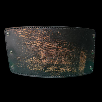 Handmade leather cuff wallet laid flat, showing the hand-worked copper patina and the row of snap fasteners - AG Design, Arad, Romania