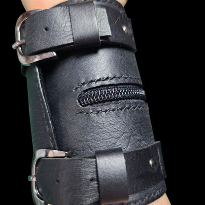 Hand-stitched edge and metal buckle on a handmade black leather cuff wallet - AG Design, Arad, Romania