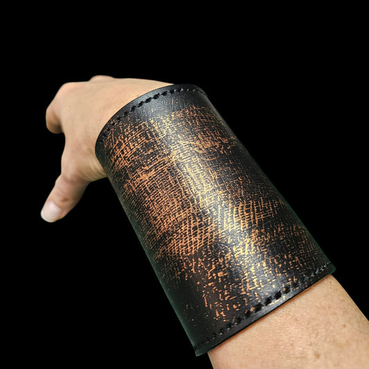 Handmade black leather cuff wallet with hand-worked copper patina, worn on the wrist - AG Design, Arad, Romania