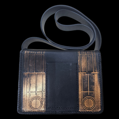 Handmade leather shoulder bag seen from the front, closed, with a gate shape embossed into the leather - AG Design, Arad, Romania