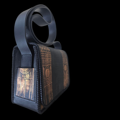 Side view of a handmade leather shoulder bag with hand-stitched edges - AG Design, Arad, Romania