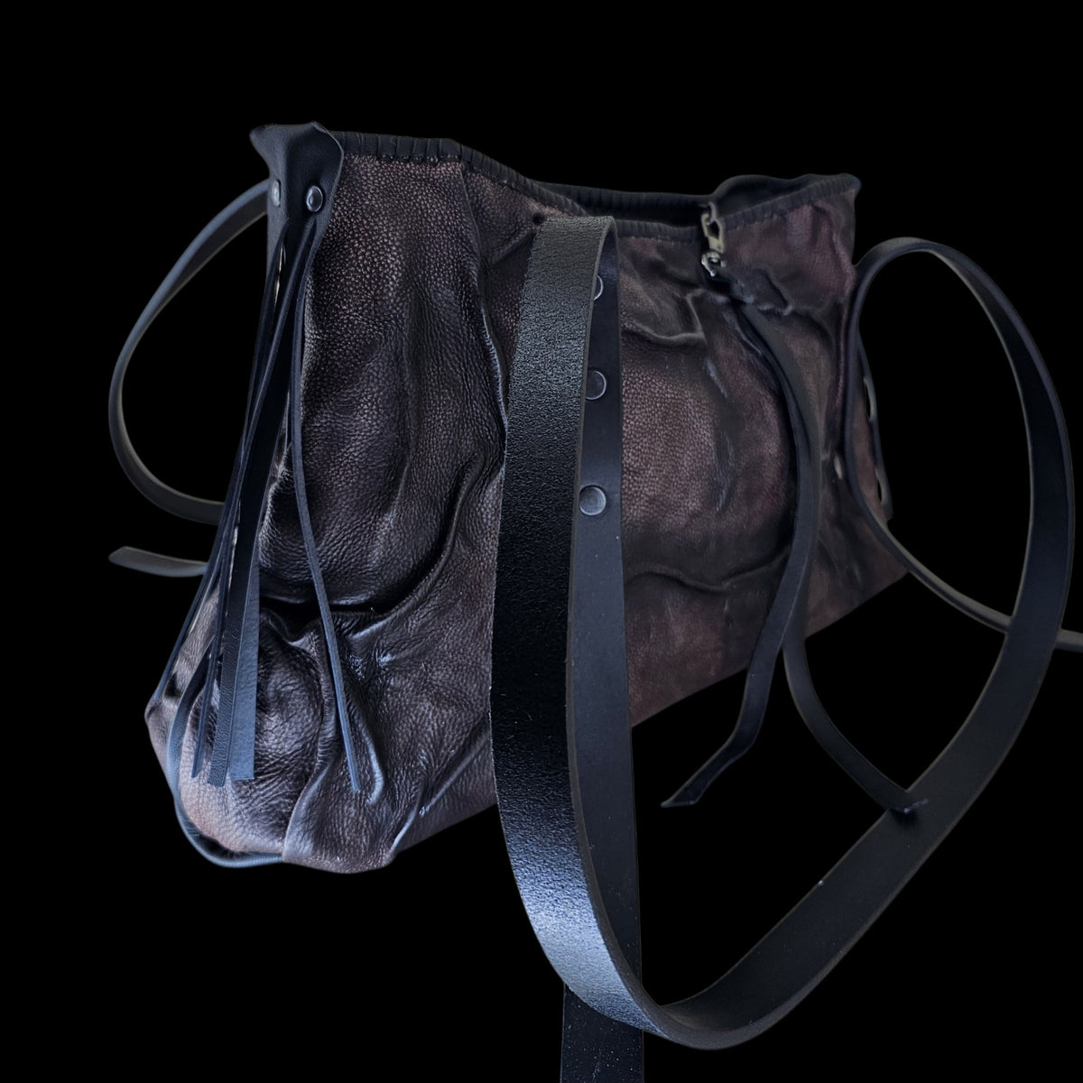 Full view of a handmade airbrushed relief leather shoulder bag with two long riveted straps - AG Design, Arad, Romania