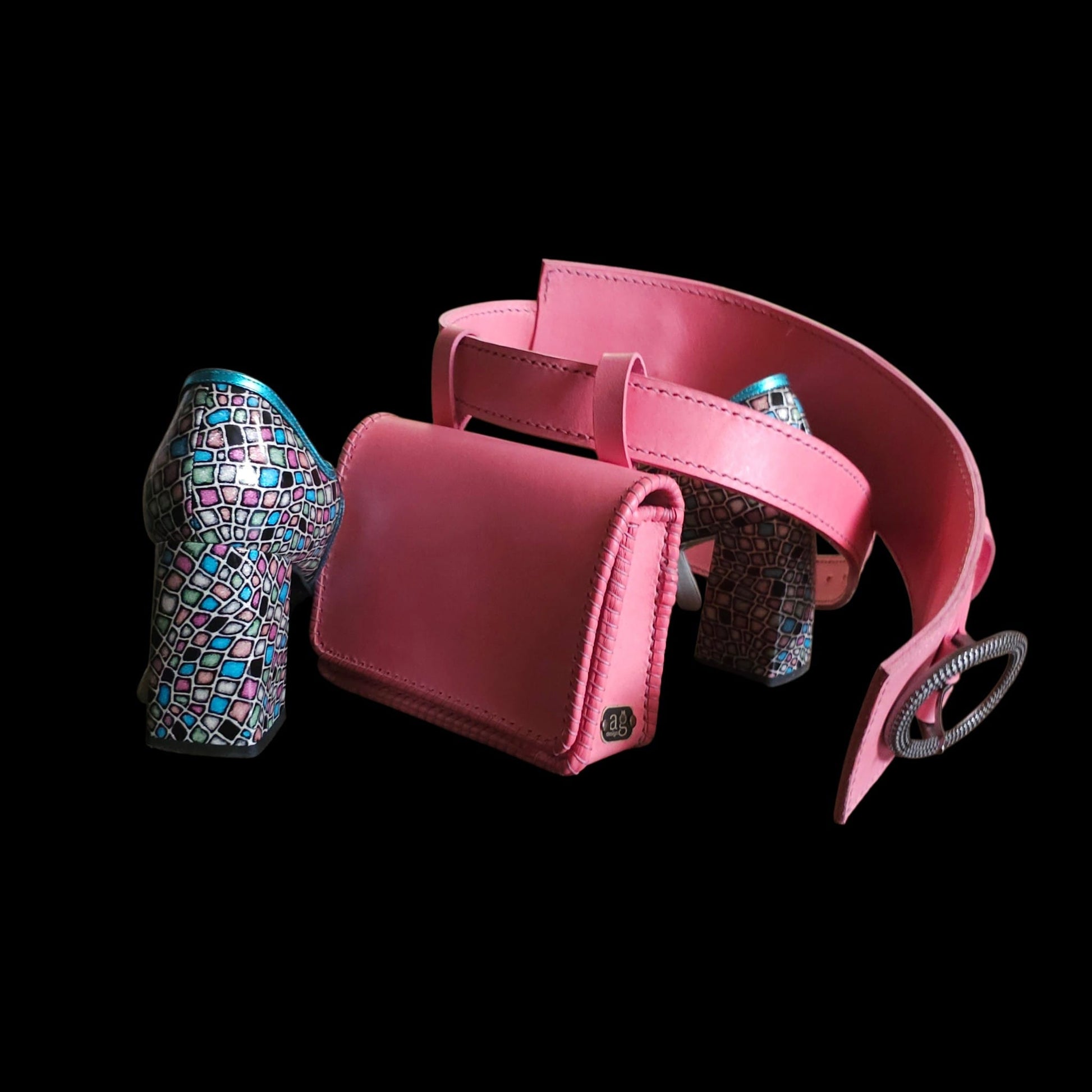 Handmade pink leather belt and detachable pouch beside a pair of mosaic-patterned heels - AG Design, Arad, Romania
