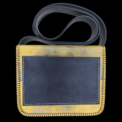 Back view of a handmade mustard yellow leather crossbody bag - AG Design, Arad, Romania