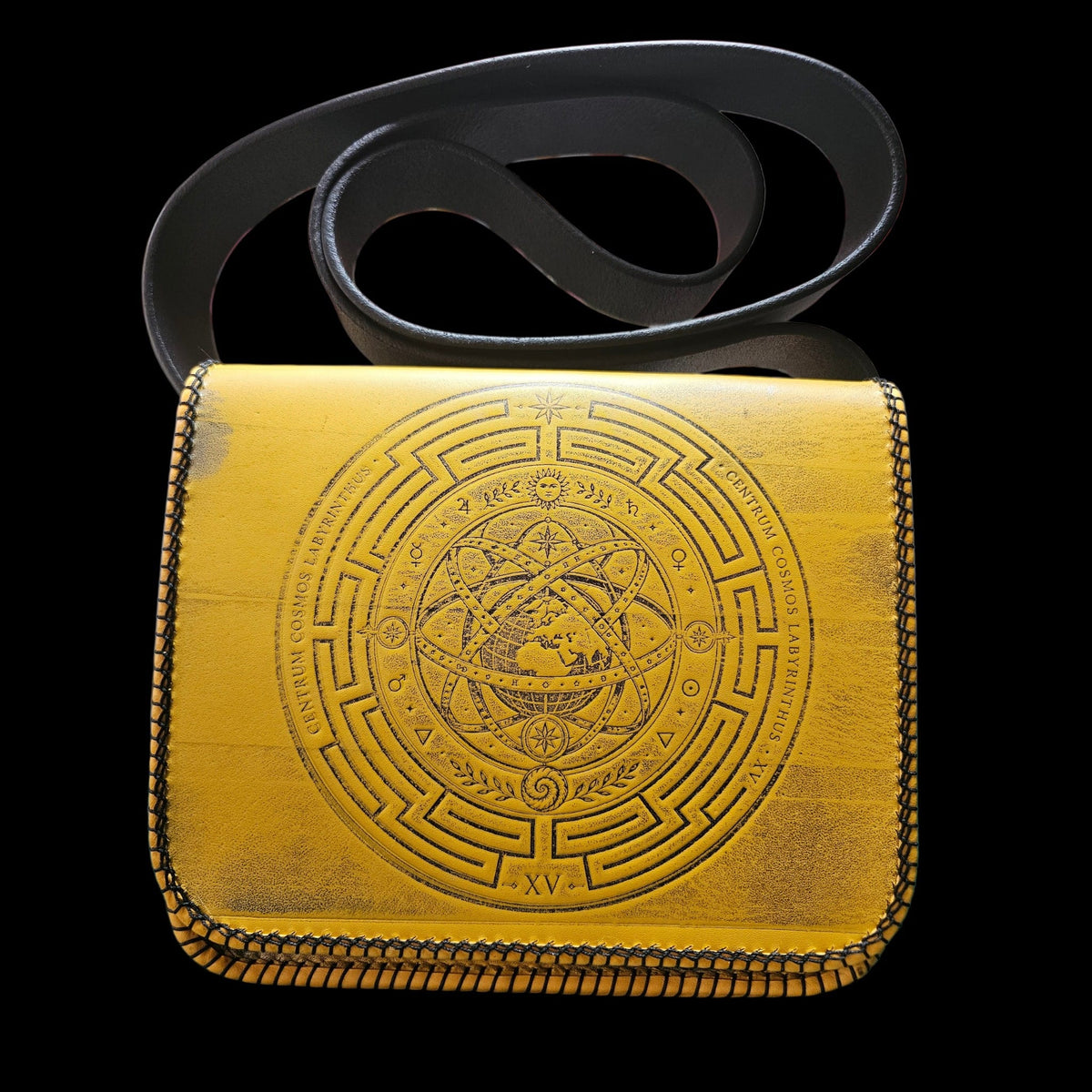 Handmade mustard yellow leather crossbody bag seen from the front with its fixed strap laid above it - AG Design, Arad, Romania